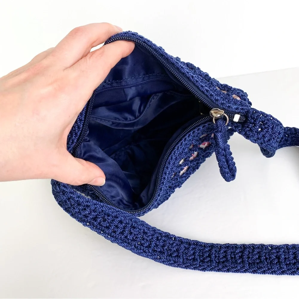 Vintage Mudd crossbody crochet or macrame bag, navy with pink floral lining