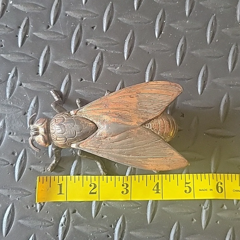 Vintage brass fly