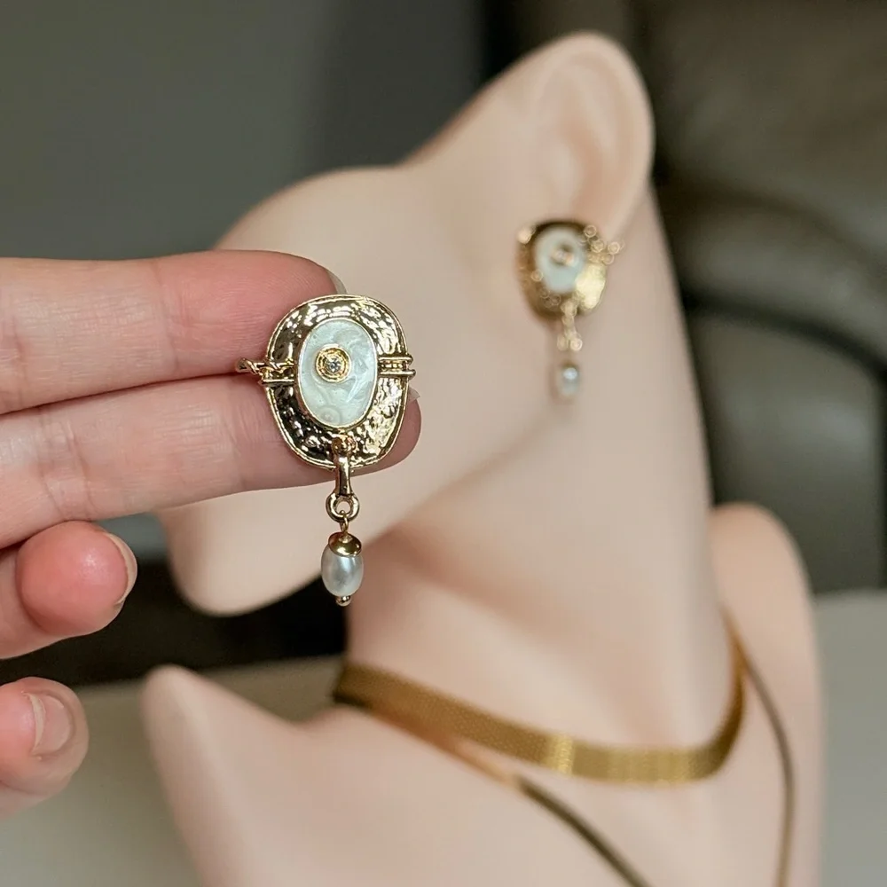 Anthropologie elegant gold