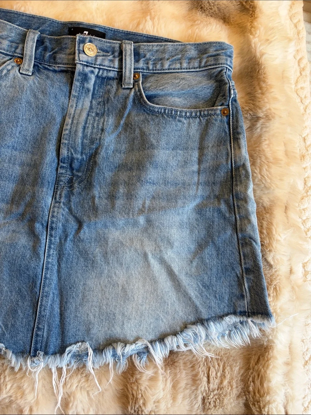 7 for all mankind denim mini skirt distressed hemline light wash size 29