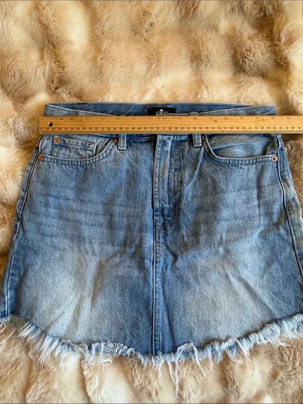7 for all mankind denim mini skirt distressed hemline light wash size 29