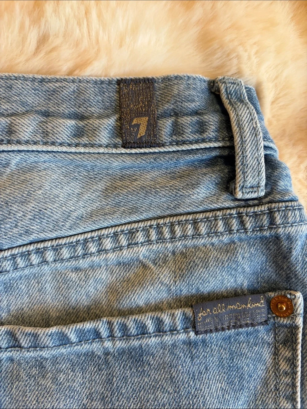 7 for all mankind denim mini skirt distressed hemline light wash size 29