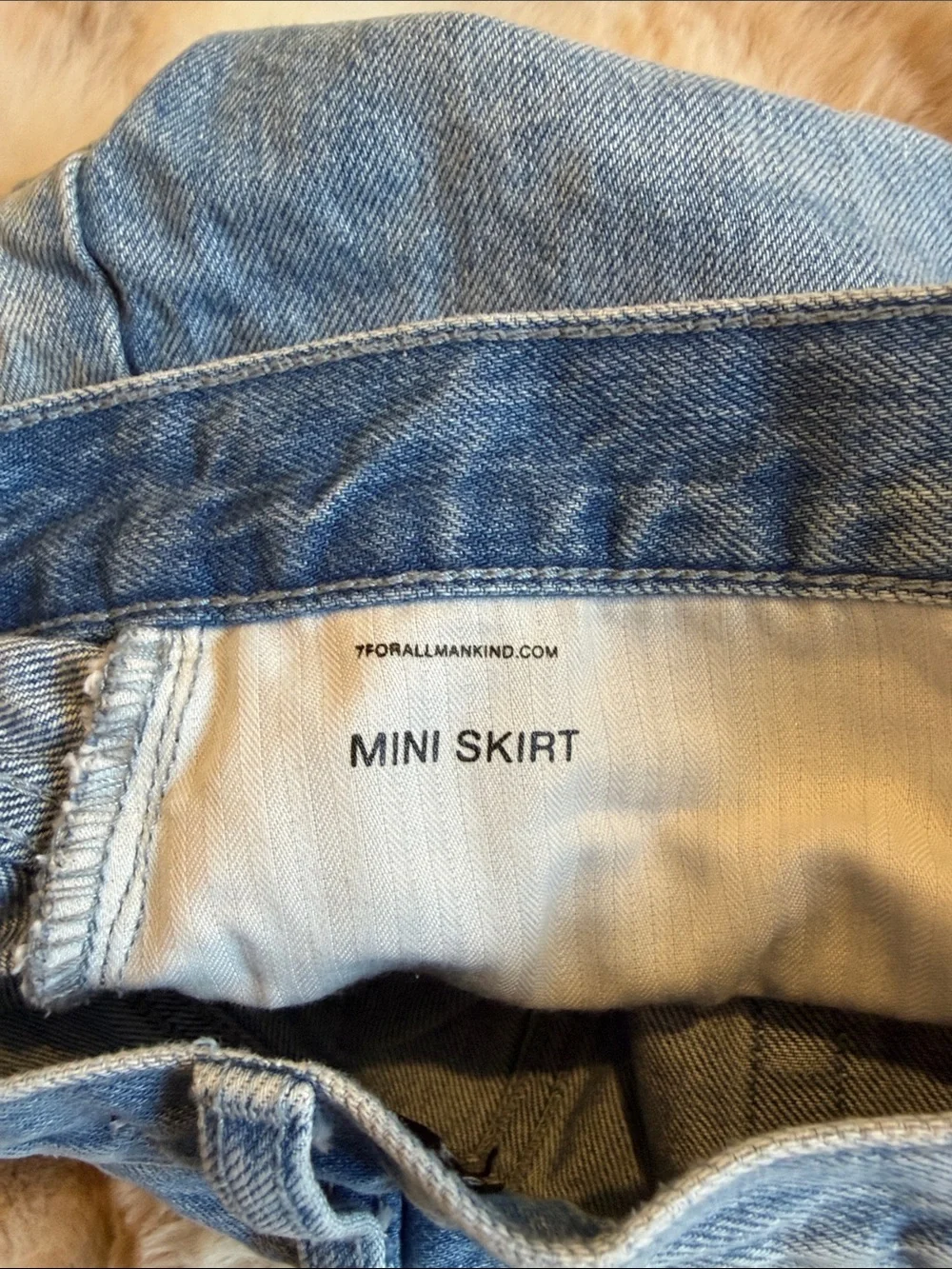 7 for all mankind denim mini skirt distressed hemline light wash size 29