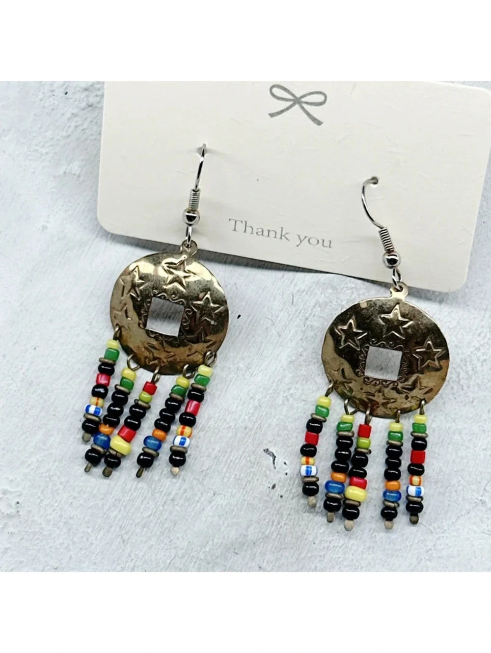 824mc. Goldtone Star Whimsigoth Earrings
