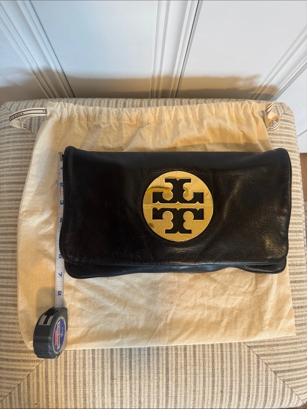 Tory Burch Black Leather Fold-Over Clutch with Gold Logo Medallion