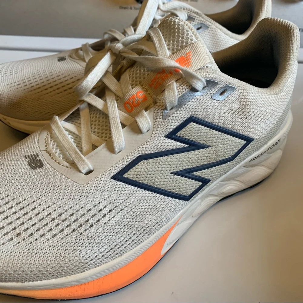 New Balance womens Neutral Running Shoes - Cream with Orange Accents