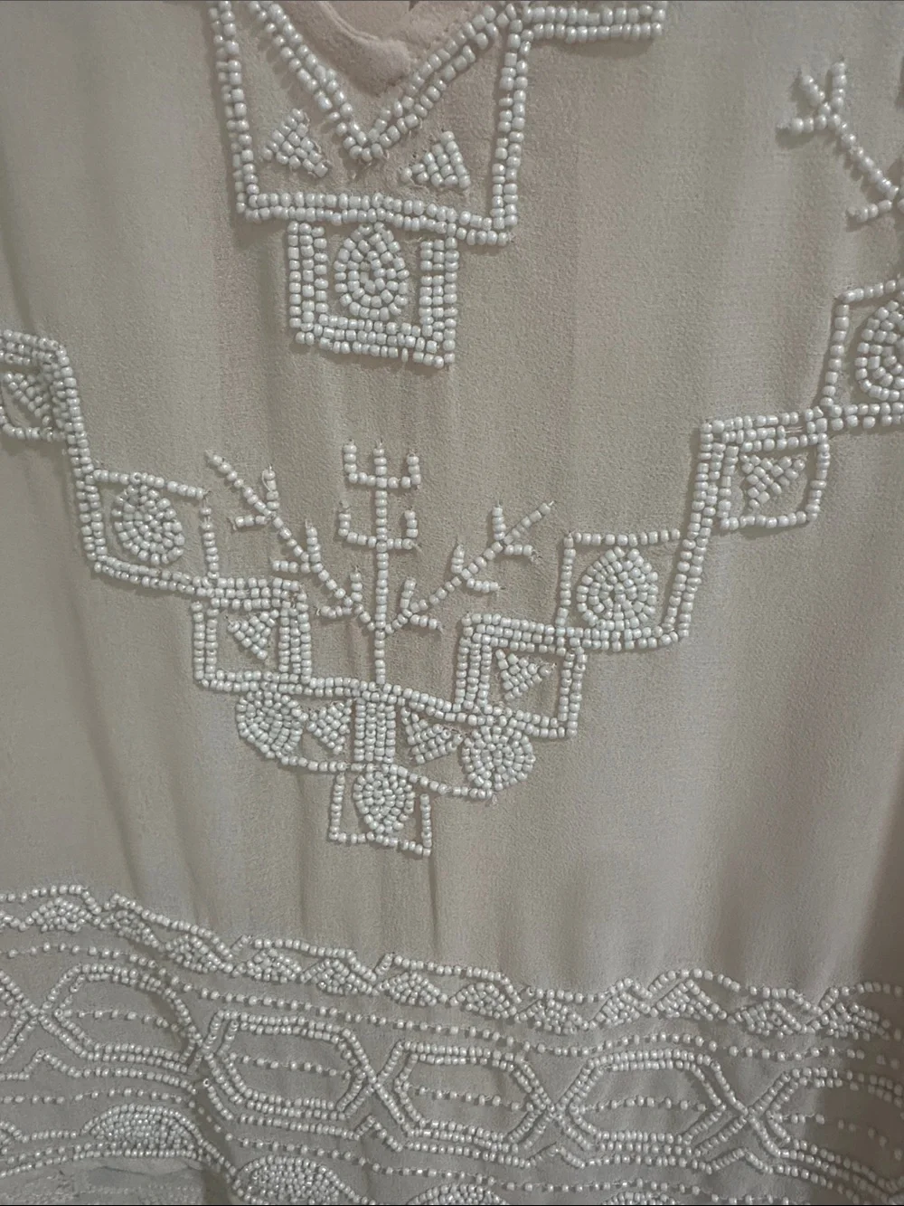 Free People but accents neckline