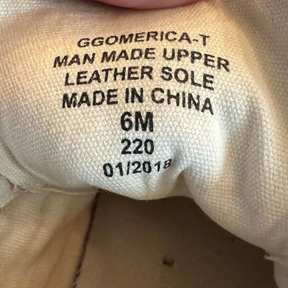 Guess owned white
