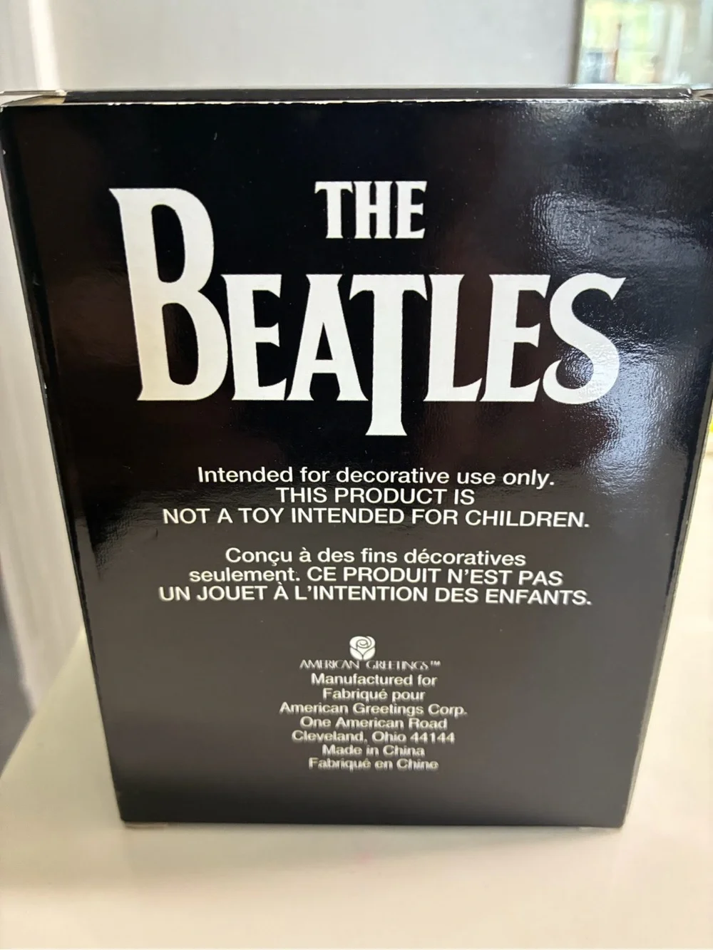 The Beatles image features