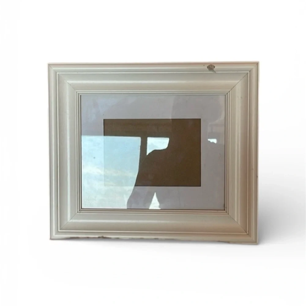White frame not new had some paint section that was removed can be repaired