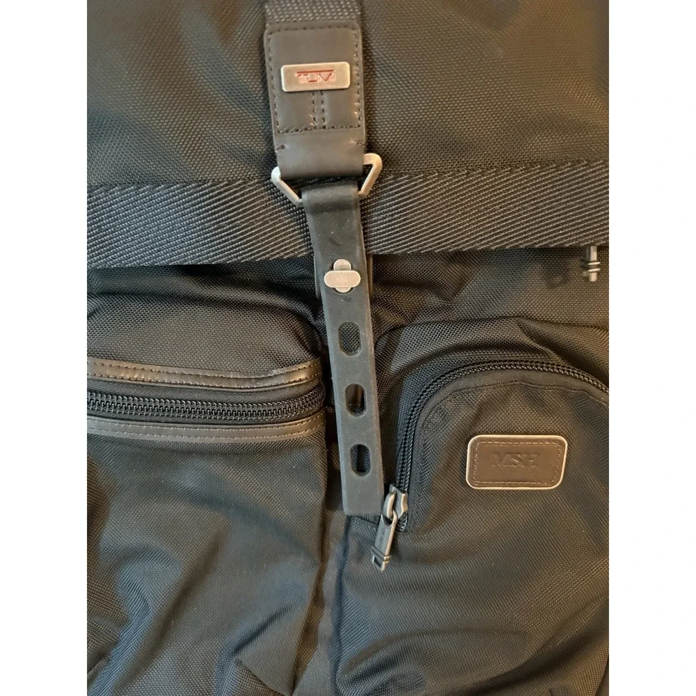 Tumi Black Nylon Backpack with Brown Leather Base and Trim