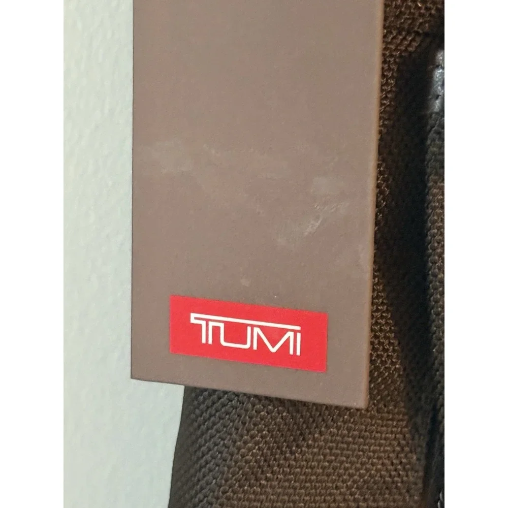 Tumi Black Nylon Backpack with Brown Leather Base and Trim