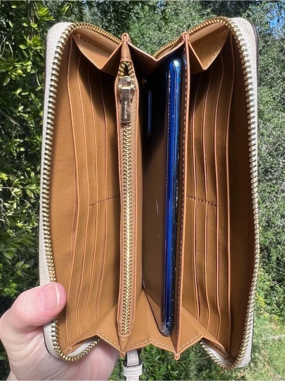 Coach accordion zip