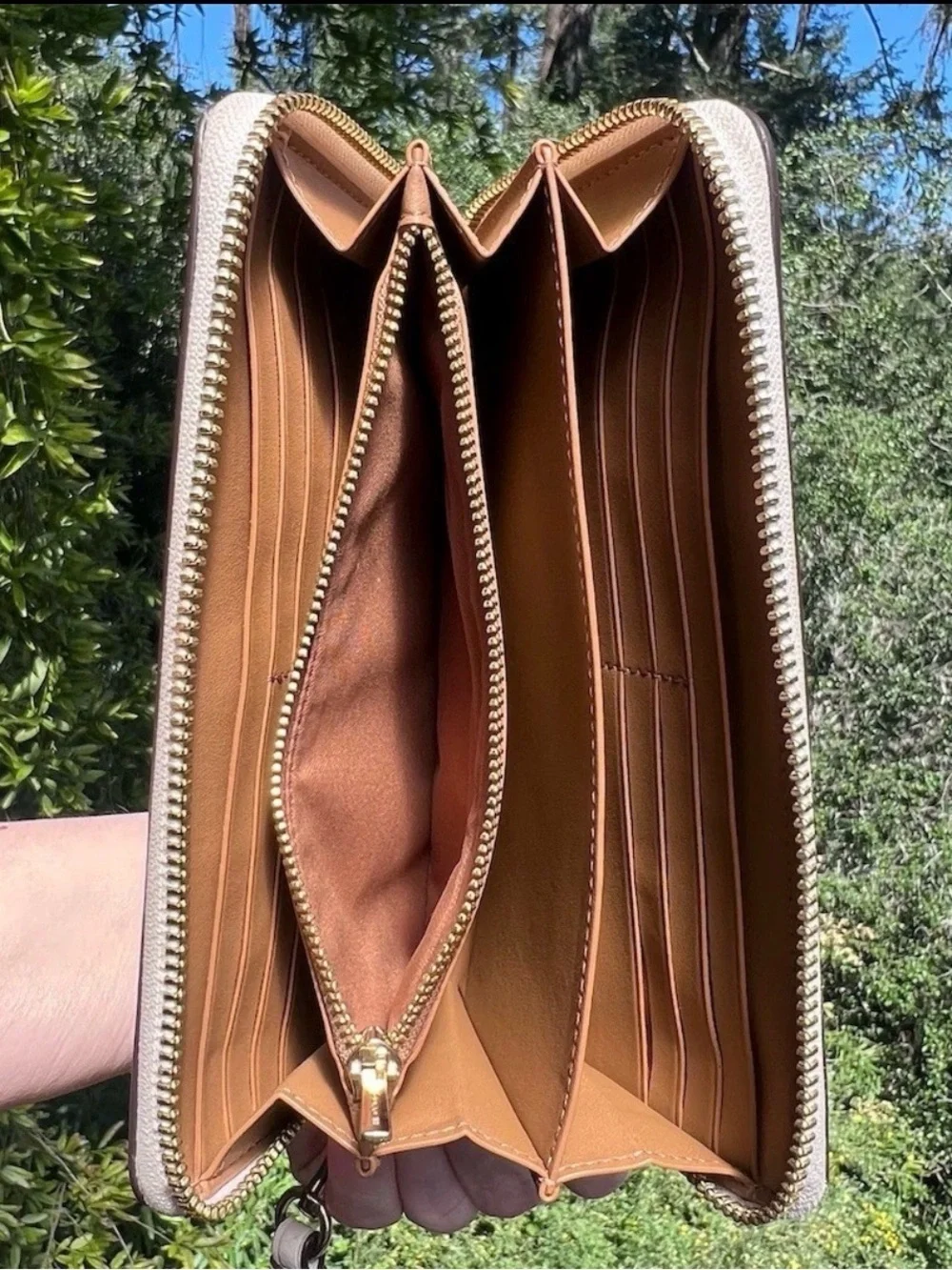 Coach accordion zip