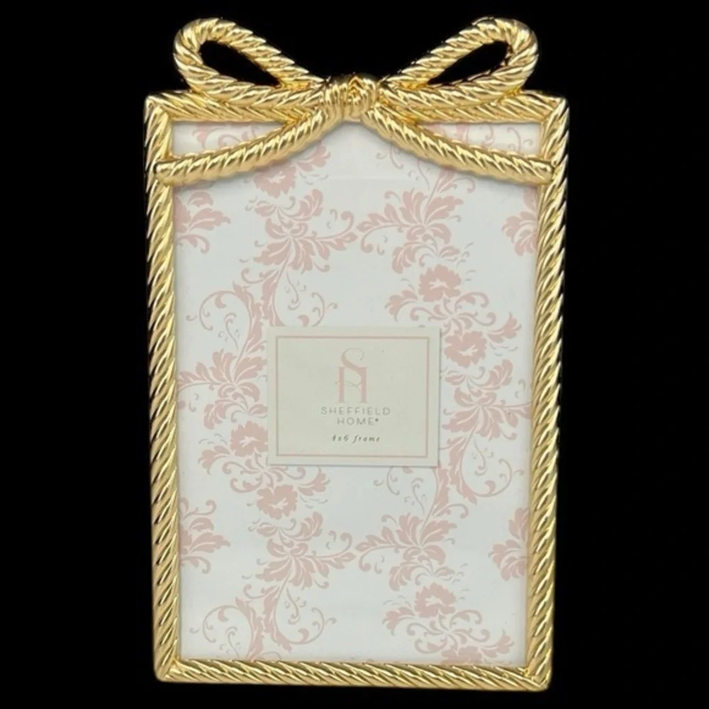 SheffieldHome - ‘Golden Bow’ metal picture frame. 4” x 6”. NWT.