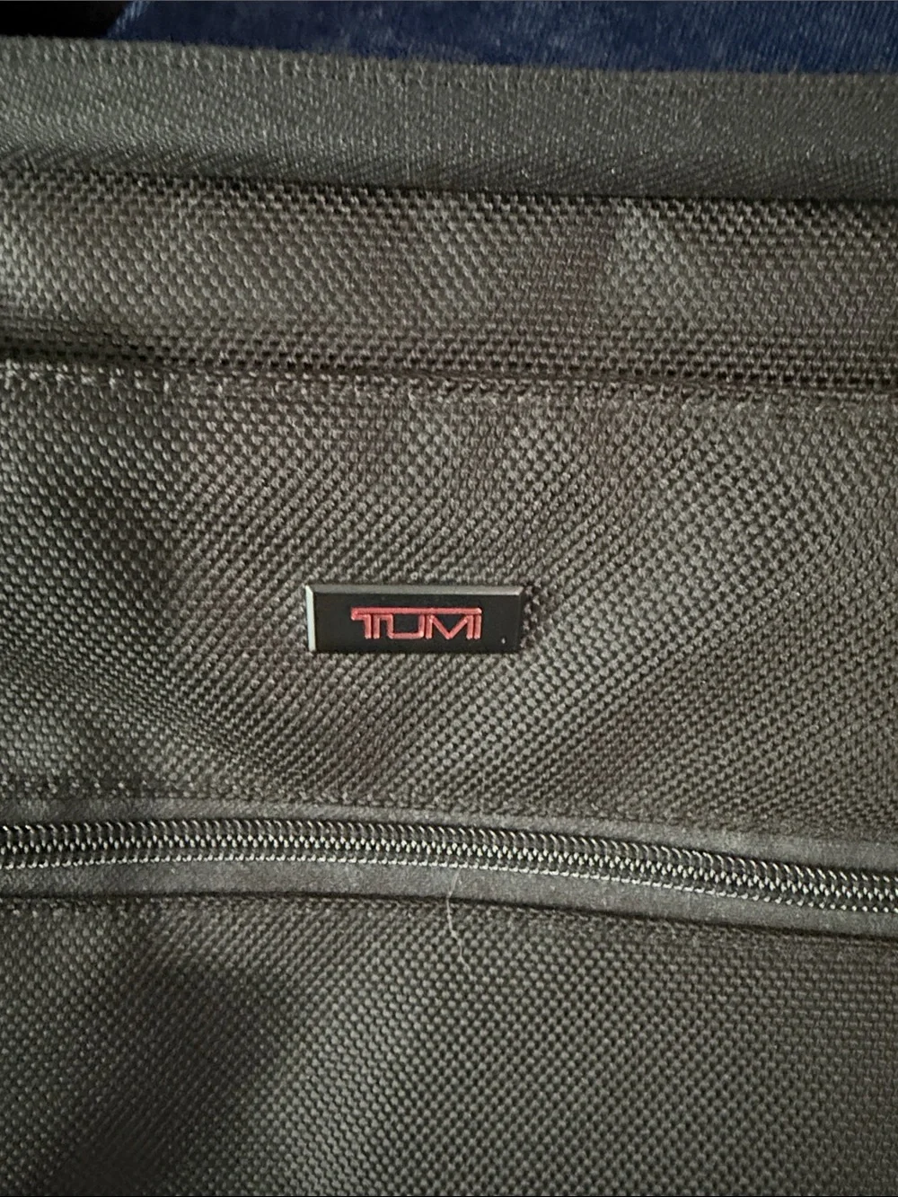 Tumi sleek black
