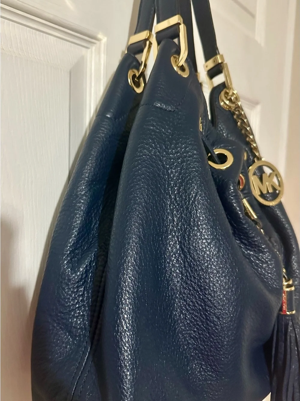 Michael Kors Navy Pebbled Leather Tassel Hobo with Gold Hardware