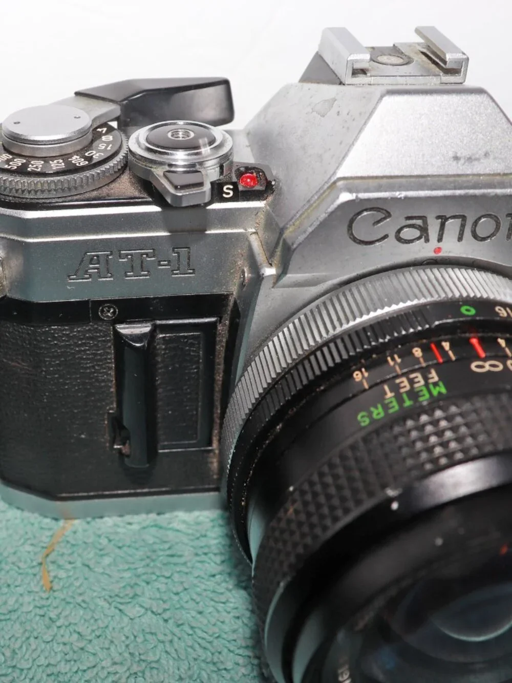 Canon AT-1 35mm Film Camera W/Vivitar 55mm Lens for parts. Shutter Not Working.