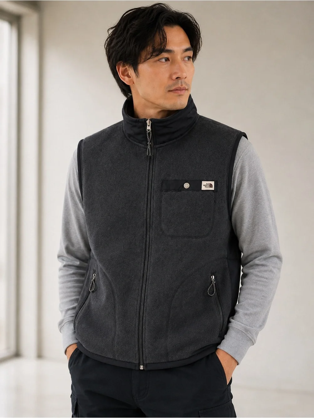 The North Face Men's Dark Charcoal Fleece Vest with Zip Pockets