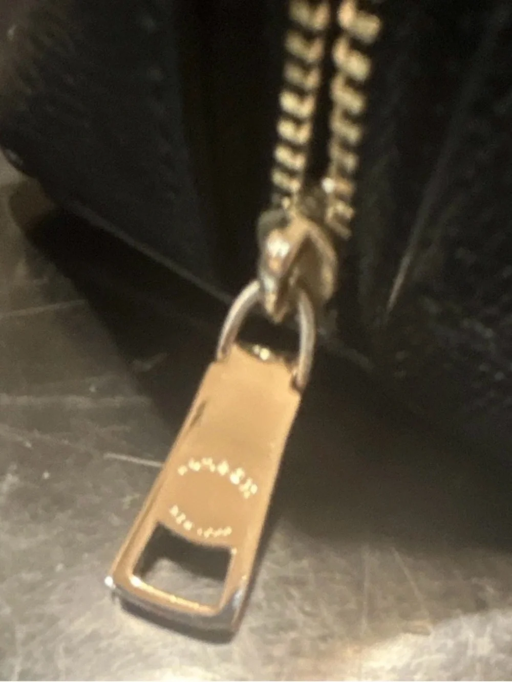 Coach sleek black