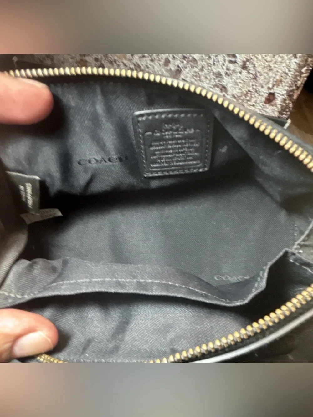 Coach sleek black