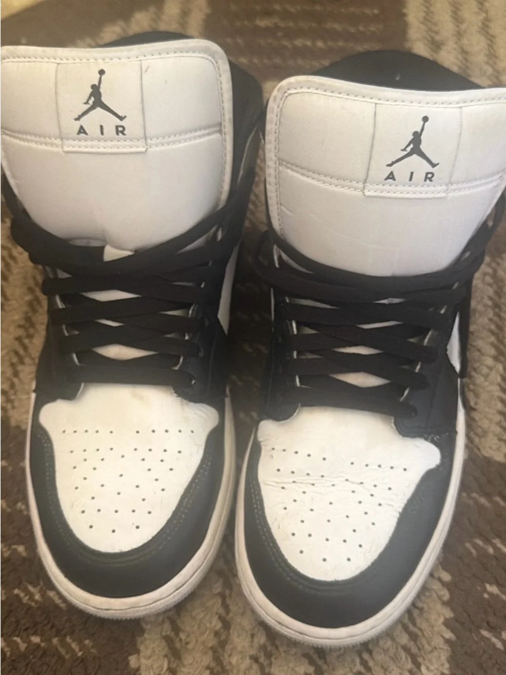 Jordan Black and White High-Top Sneakers
