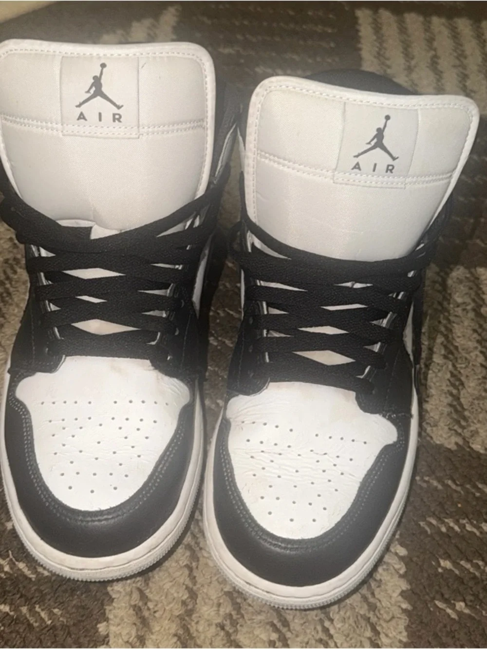 Jordan Black and White High-Top Sneakers