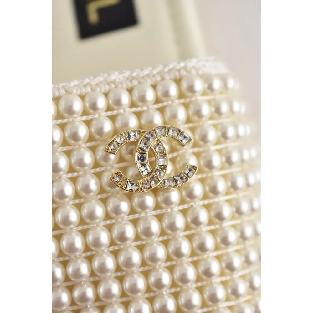 CHANEL 25p ivory
