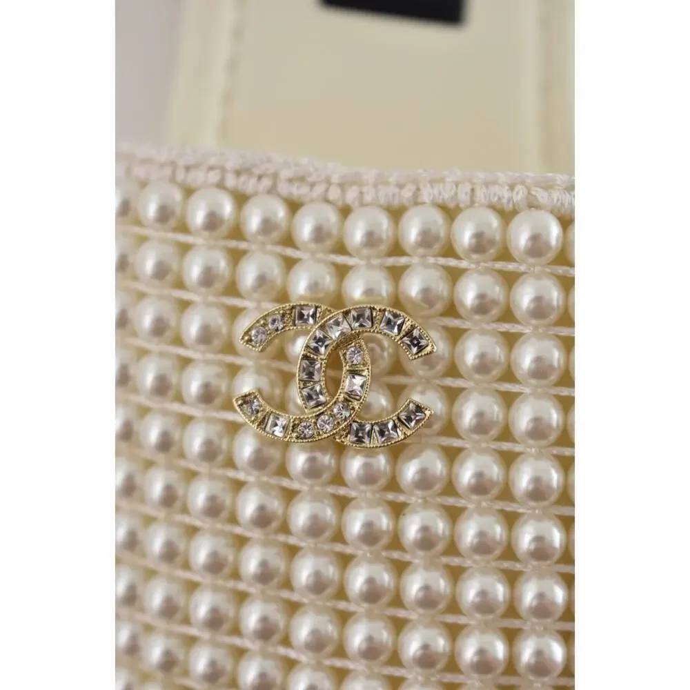CHANEL 25p ivory