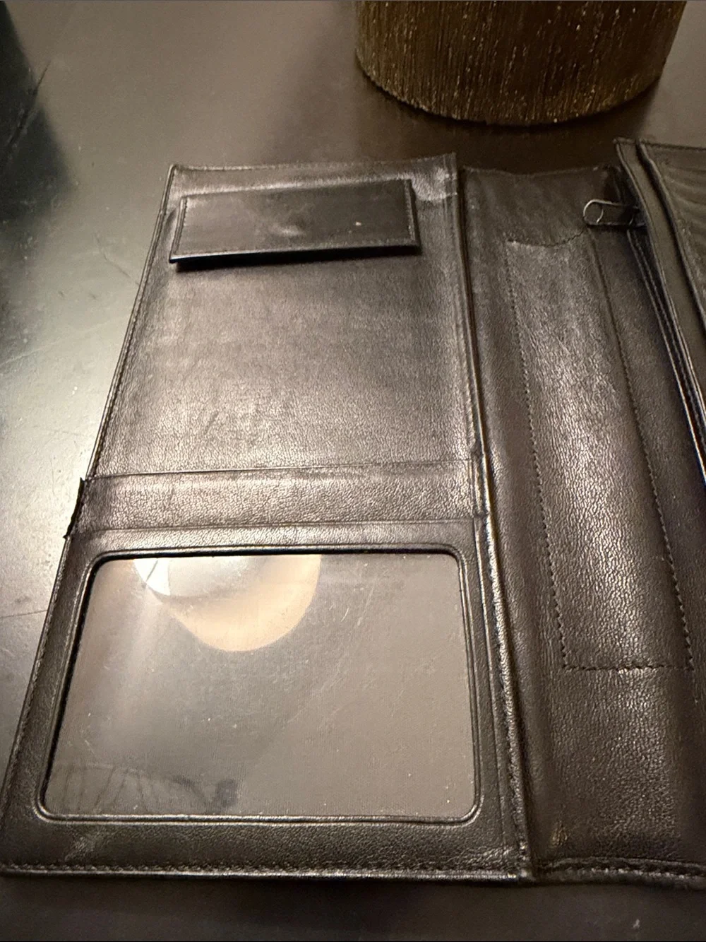 Tumi Black Leather Trifold Travel Wallet with Red Logo (9x5 in.)