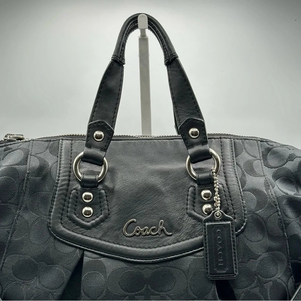 Coach black signature