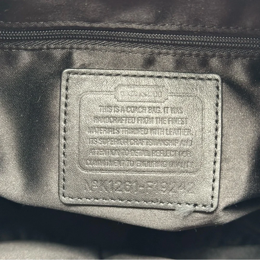 Coach black signature