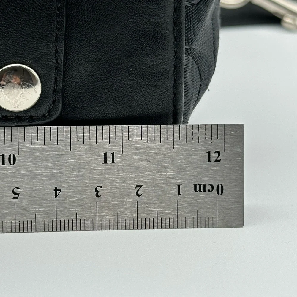 Coach black signature