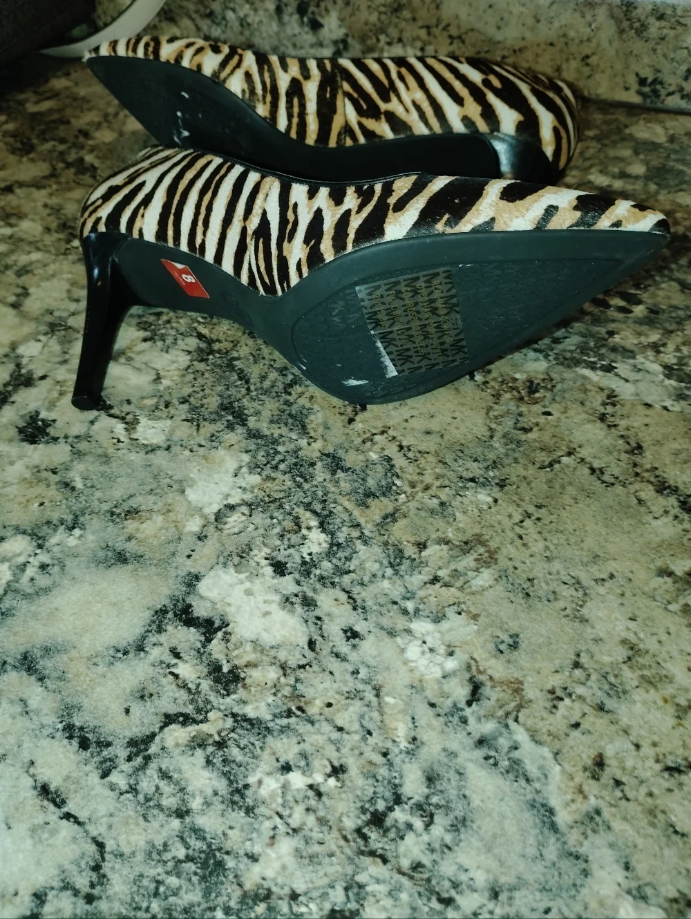 Michael Kors pony quality fusion