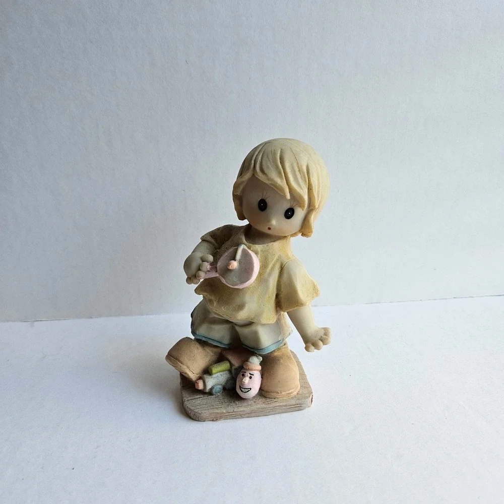 Vintage Style Boy Playing Paddle Ball Resin Figurine Collectible Home Decor