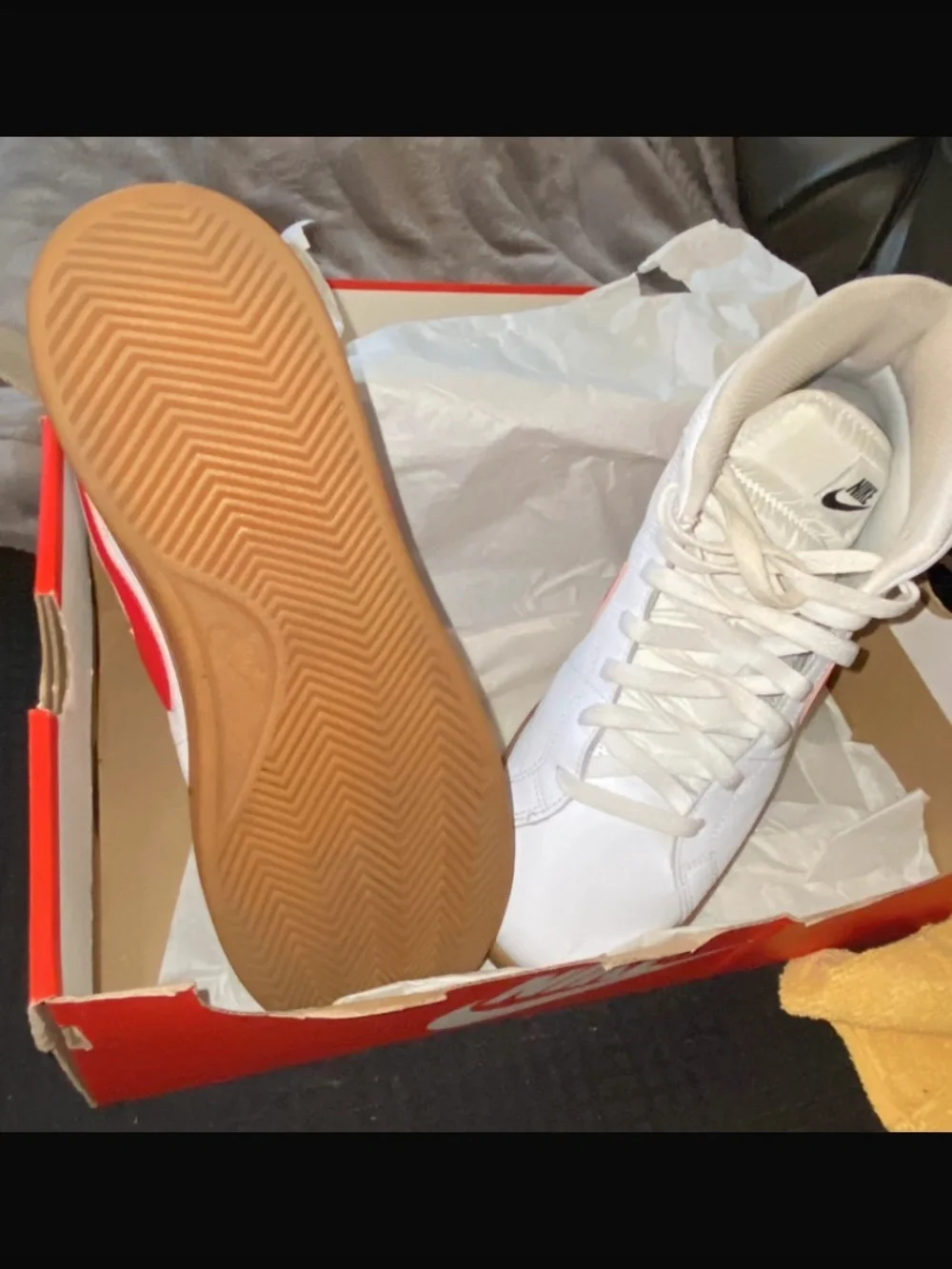 Nike White High-Top Sneakers with Red Swoosh and Gum Sole