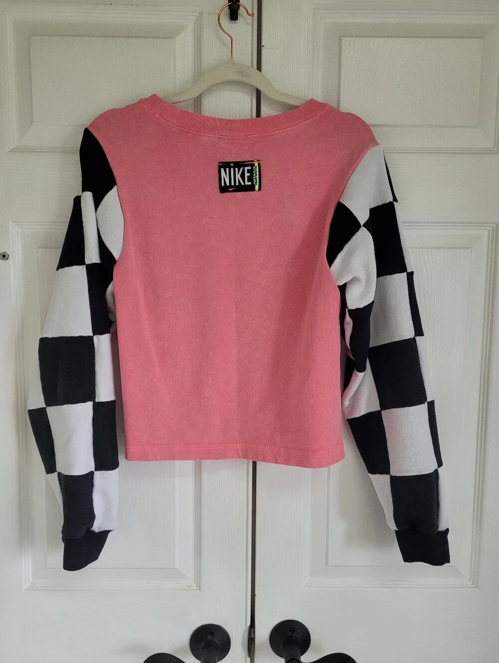 Nike Pink Sweatshirt with Black & White Checkerboard Sleeves
