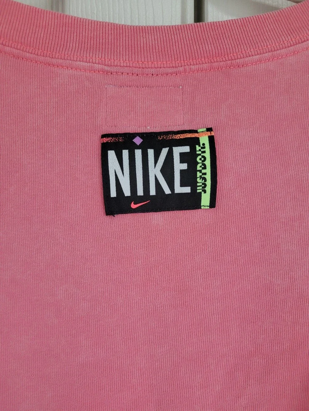 Nike Pink Sweatshirt with Black & White Checkerboard Sleeves