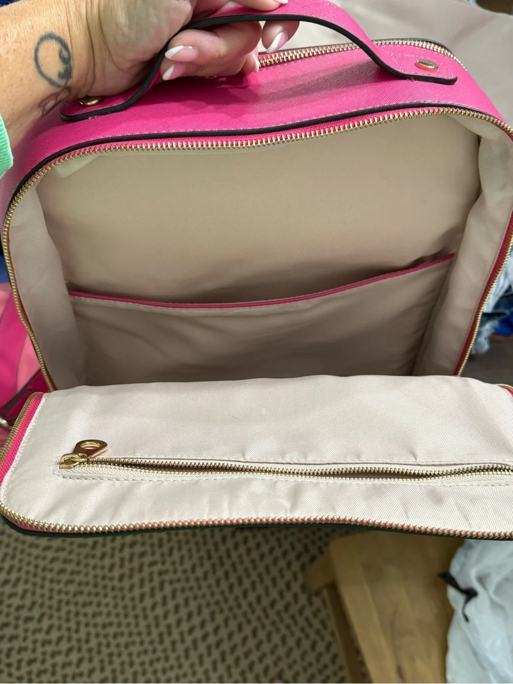 CALPAK Kaya Laptop Backpack in the vibrant Dragonfruit hot pink