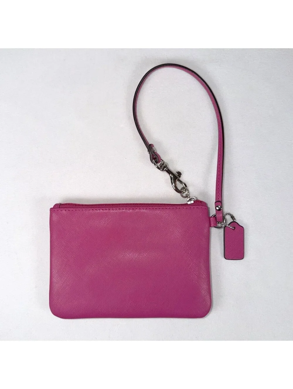 Coach fuchsia corner