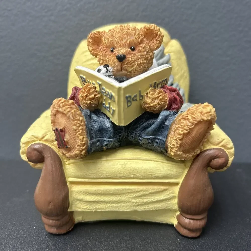 Baby Bear Sitting In Yellow Chair Reading Book With Stuffed Animal Toy Figurine