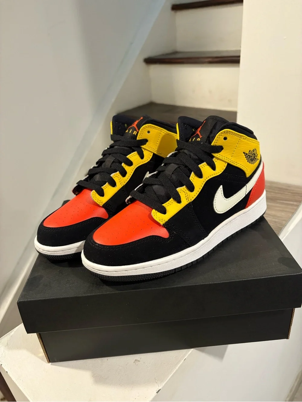 Jordan Air Jordan 1 Mid SE Black/Orange/White Youth Sneaker