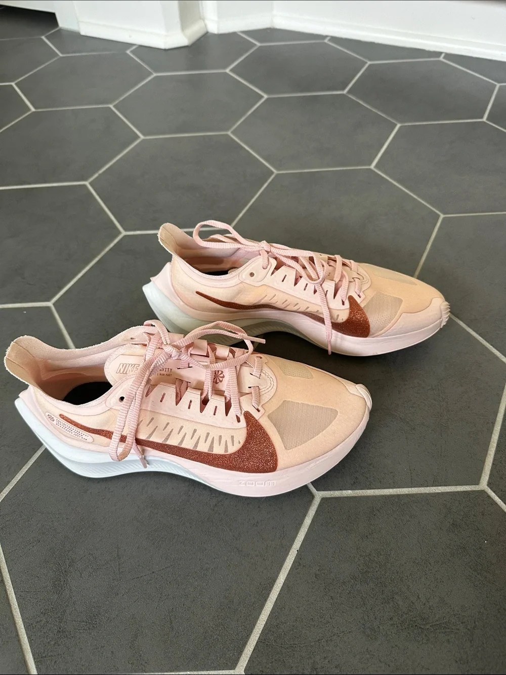Nike Women's Pink Running Shoes with Rose Metallic Swoosh