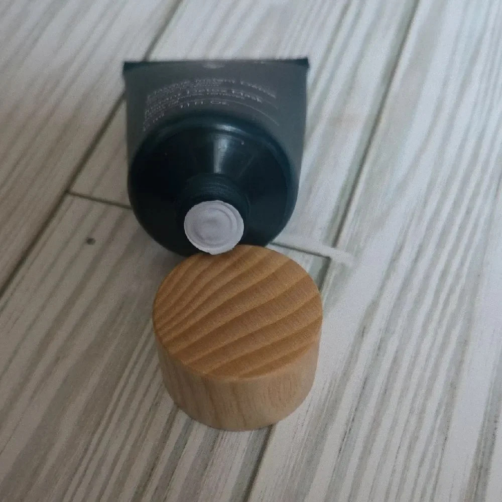 Caudalie Detox Mask in Dark Green with Wooden Cap