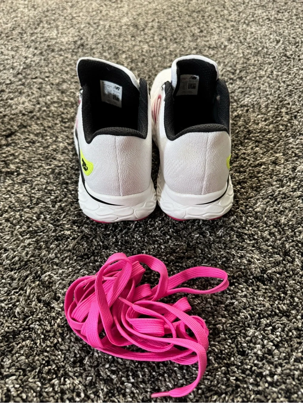 New Balance White Running Shoes with Pink Accents and Lime Highlights
