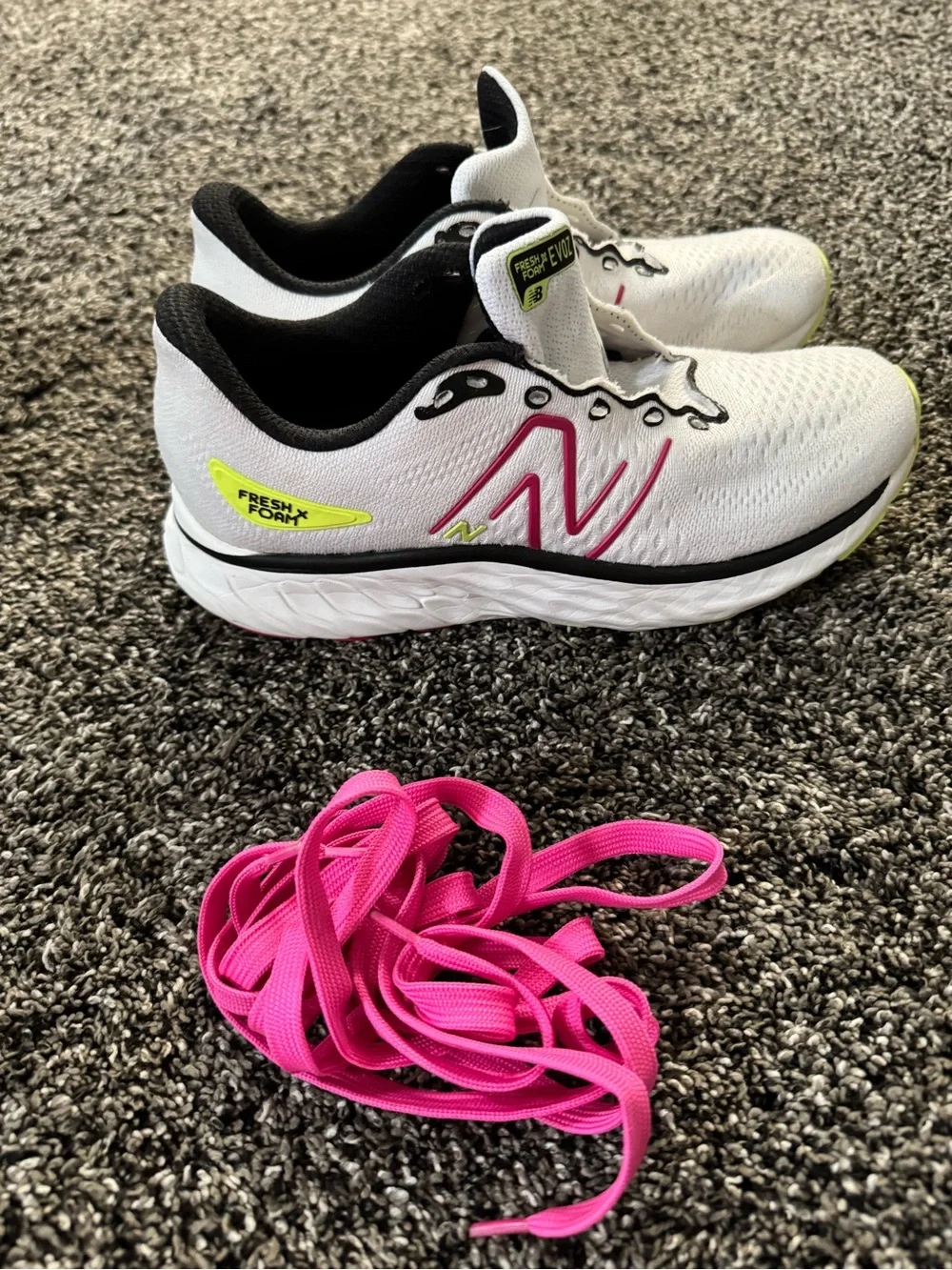 New Balance White Running Shoes with Pink Accents and Lime Highlights