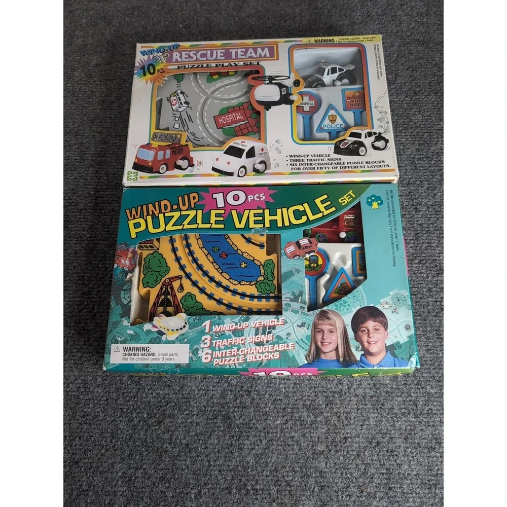 2 - Vintage Wind Up Puzzle Vehicle Sets Rescue Team & Train NEW 1990's‎ Ages 4+
