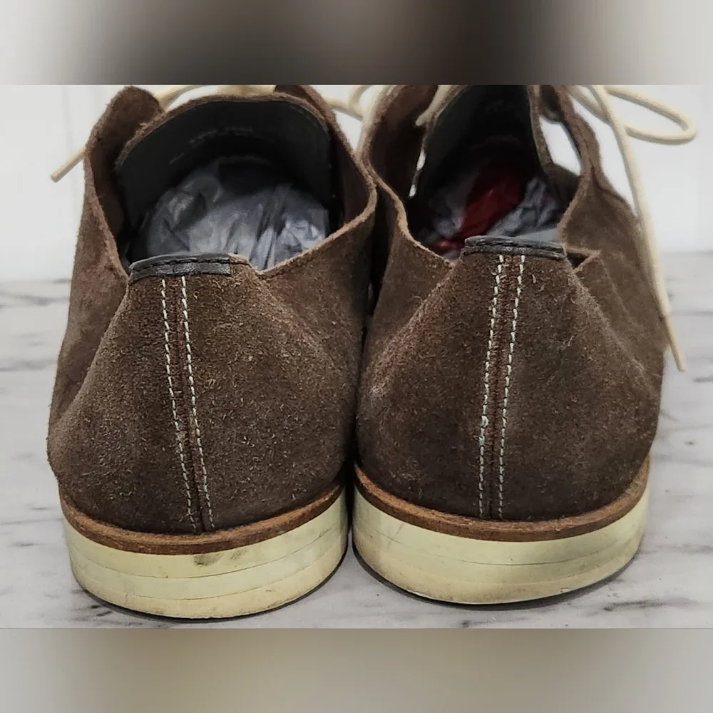 Ted Baker London ups tags leather