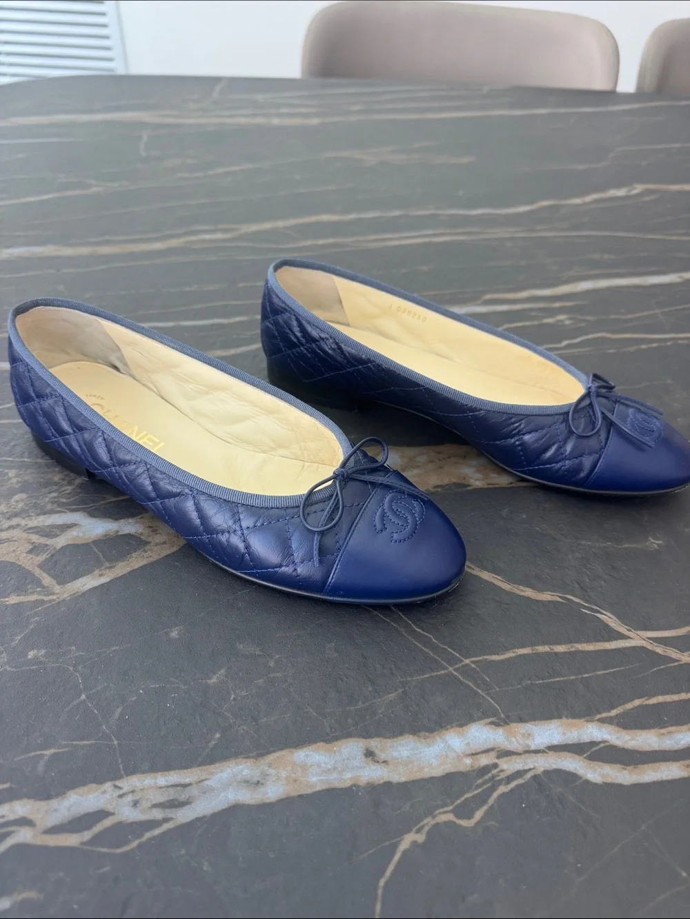 CHANEL Navy Quilted CC Bow Ballet Flats