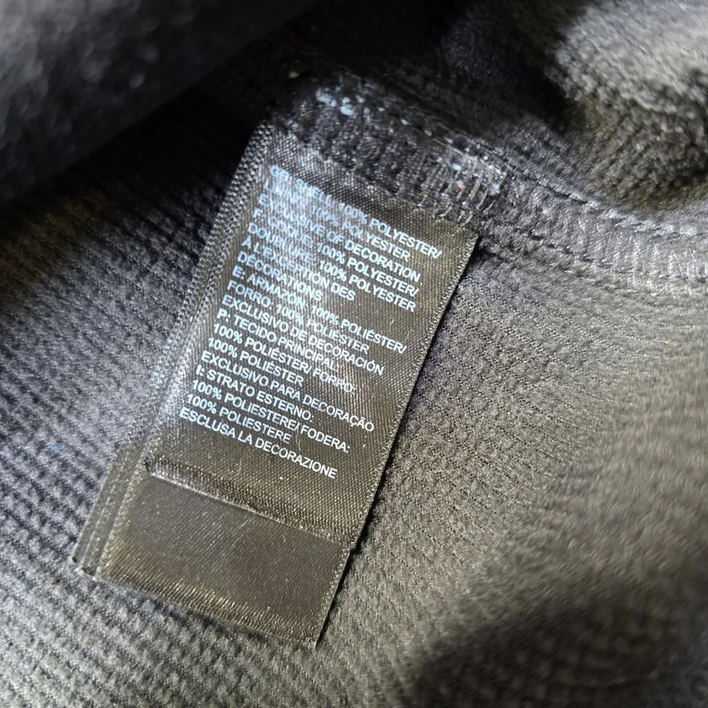 The North Face collar type crest